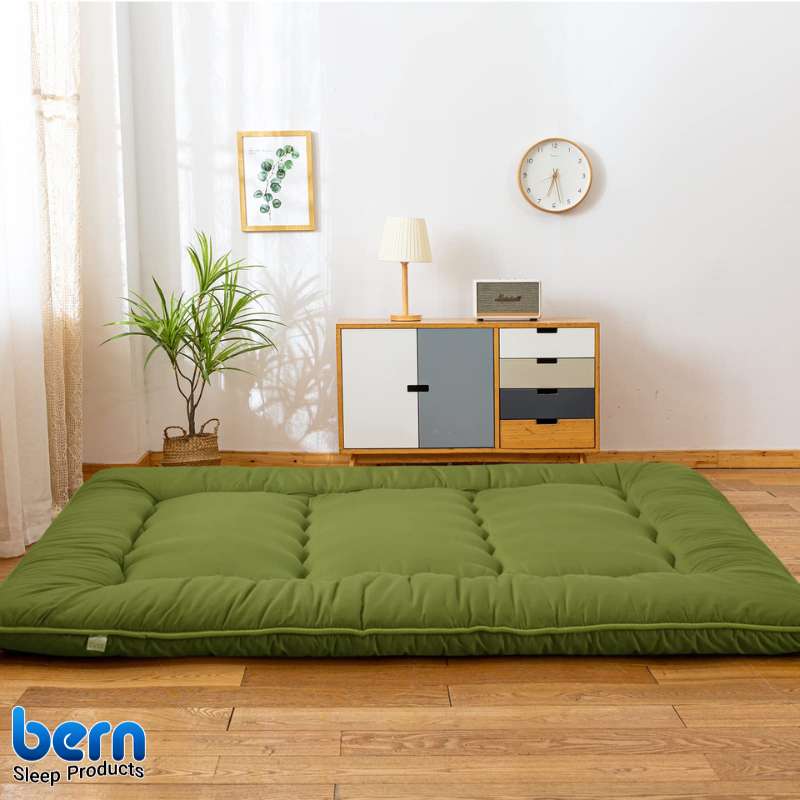 نمای نزدیک لایه‌ها و جنس تشک مسافرتی با قابلیت شستشو و ضد حساسیت